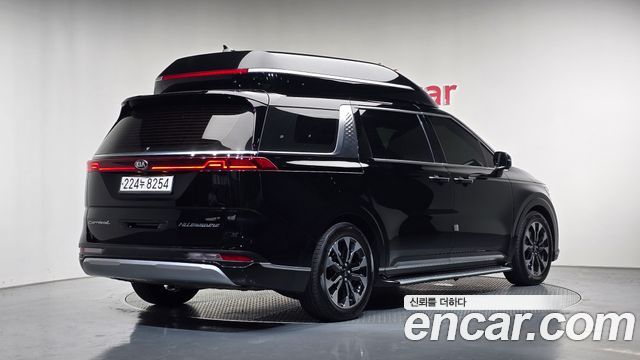 Kia Canival 2021 — photo 2