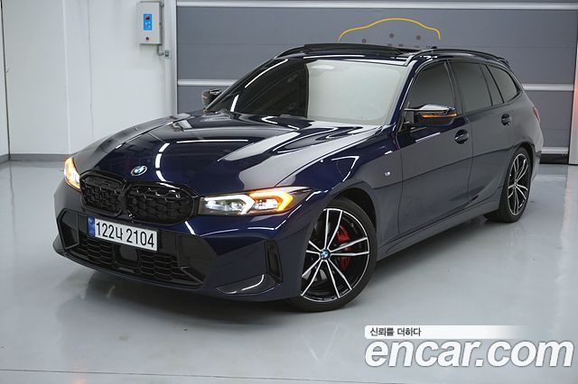 BMW 3-Series 2023 — photo 1