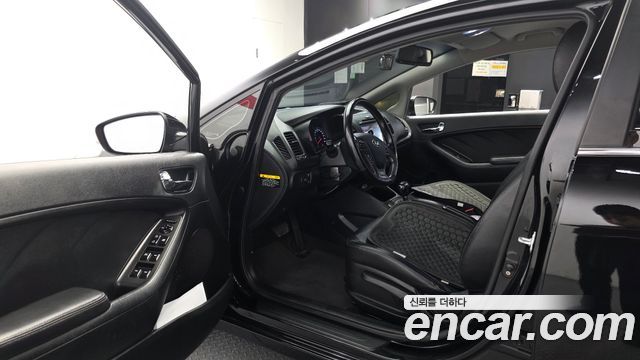 Kia K3 2013 — photo 10