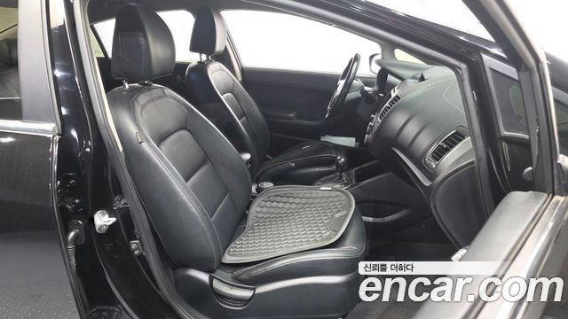 Kia K3 2013 — photo 11