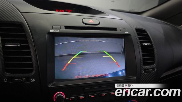 Kia K3 2013 — photo 15