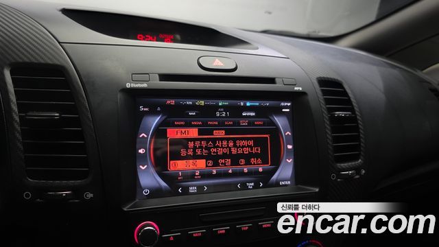Kia K3 2013 — photo 16