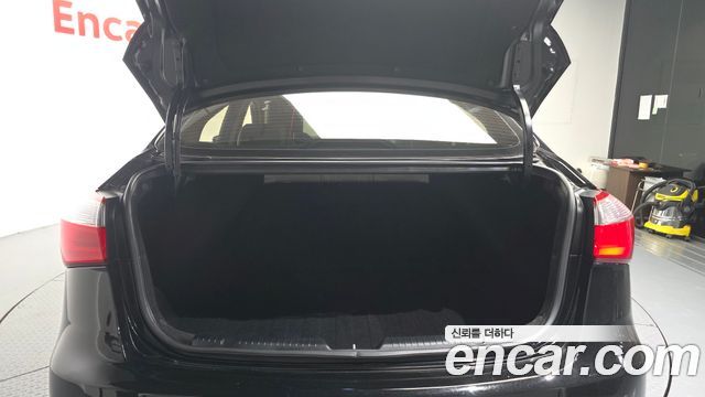 Kia K3 2013 — photo 20