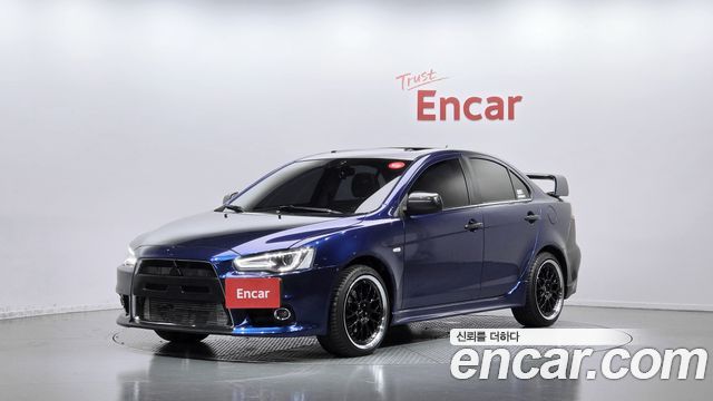 Mitsubishi Lancer 2010 — photo 1