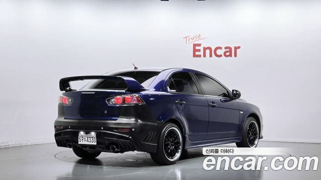 Mitsubishi Lancer 2010 — photo 2
