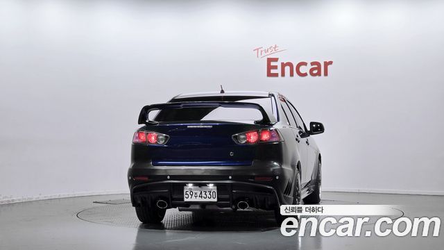 Mitsubishi Lancer 2010 — photo 4