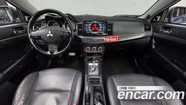 Mitsubishi Lancer 2010 — photo 7