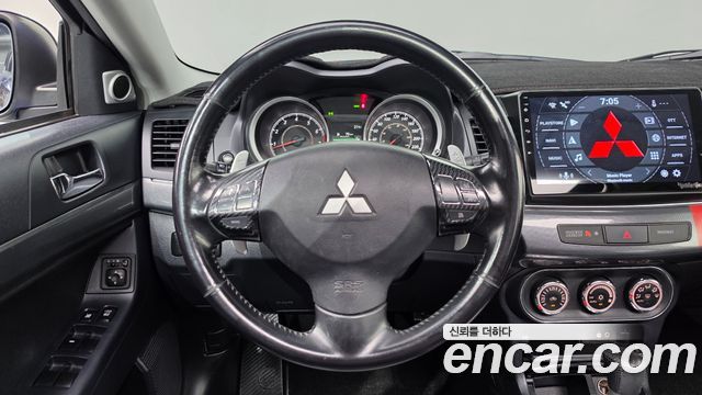 Mitsubishi Lancer 2010 — photo 13