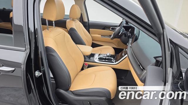 Kia Canival 2023 — photo 11