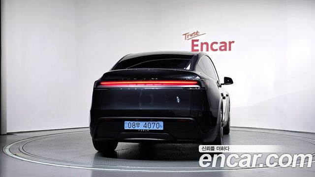 Tesla Model Y 2025 — photo 4