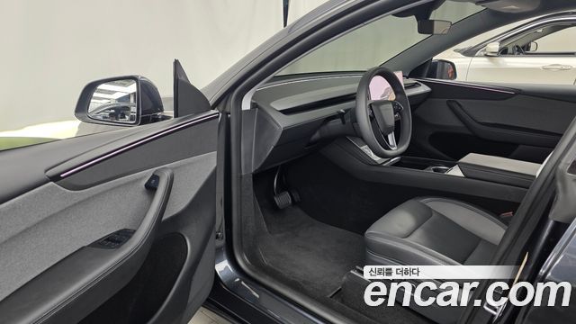 Tesla Model Y 2025 — photo 13