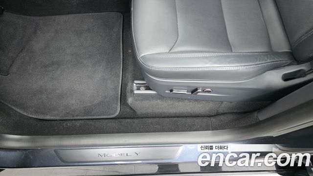 Tesla Model Y 2025 — photo 31