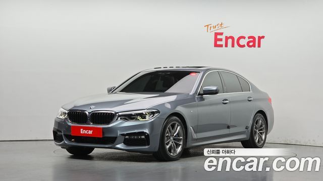 BMW 5-Series 2018 — photo 1
