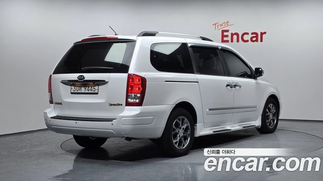 Kia Canival 2014 — photo 2