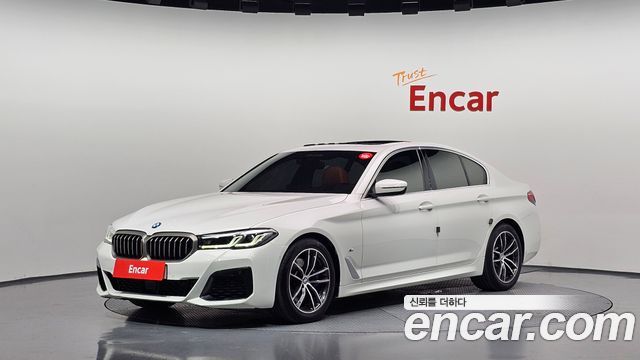 BMW 5-Series 2023 — photo 1