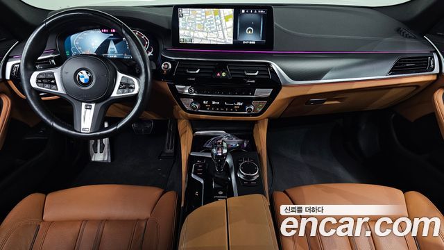 BMW 5-Series 2023 — photo 10