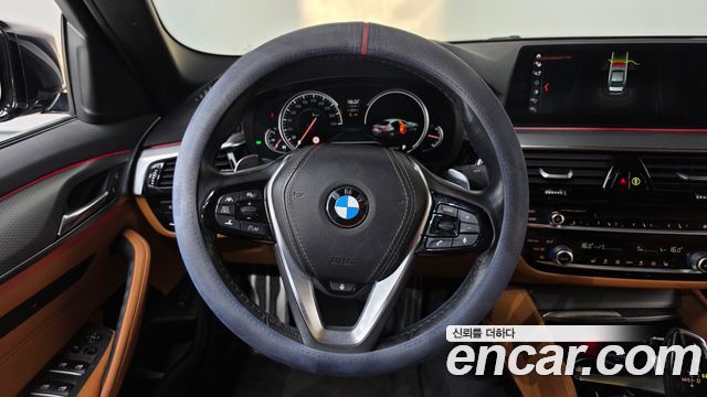BMW 5-Series 2018 — photo 18
