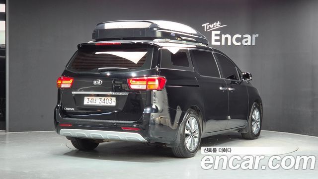 Kia Canival 2015 — photo 2