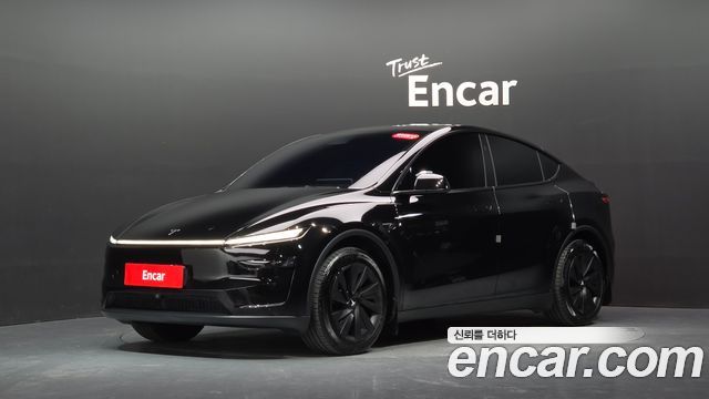 Tesla Model Y 2025 — photo 32