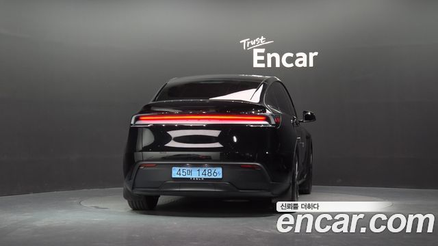 Tesla Model Y 2025 — photo 4