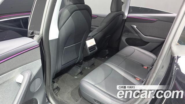 Tesla Model Y 2025 — photo 16