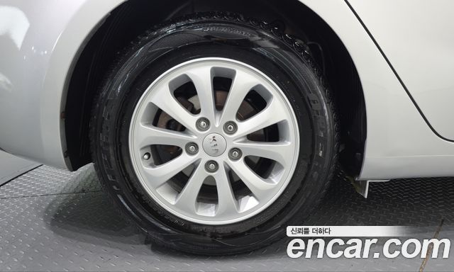 Kia K3 2013 — photo 5
