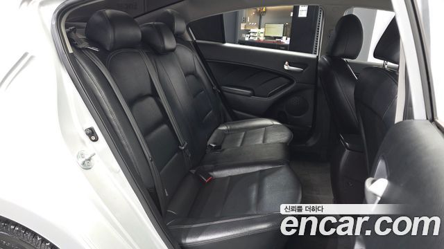 Kia K3 2013 — photo 18