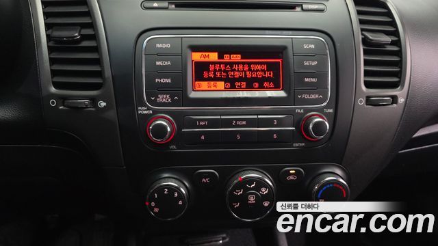 Kia K3 2013 — photo 21