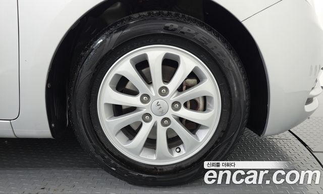 Kia K3 2013 — photo 7