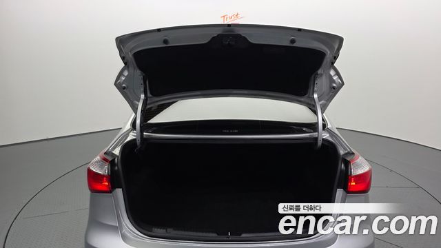 Kia K3 2013 — photo 30