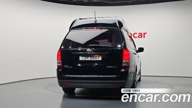 Kia Canival 2014 — photo 4