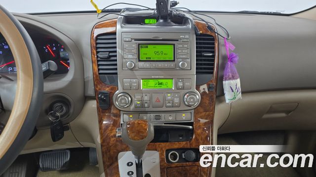 Kia Canival 2014 — photo 19
