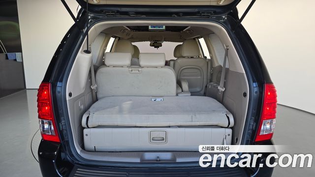 Kia Canival 2014 — photo 32