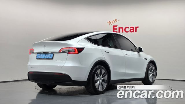 Tesla Model Y 2022 — photo 2