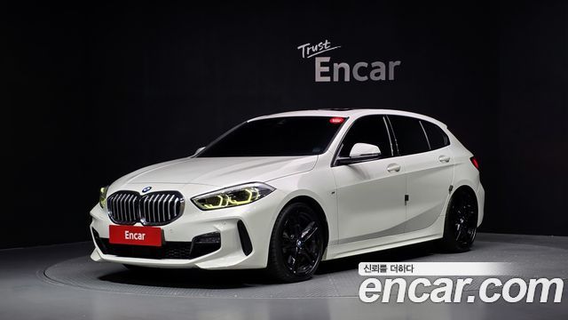 BMW 1-Series 2021 — photo 1