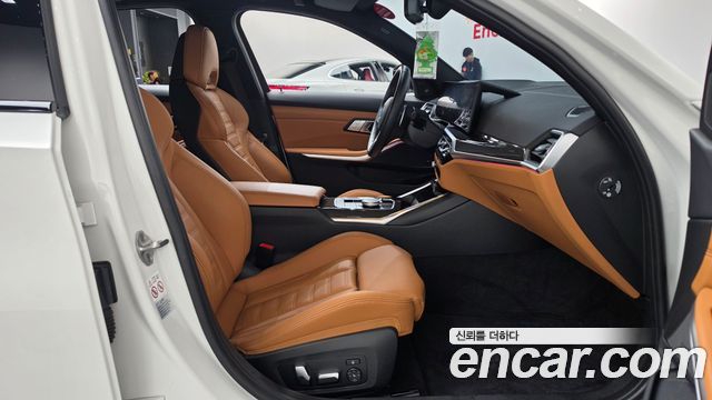 BMW 3-Series 2023 — photo 16