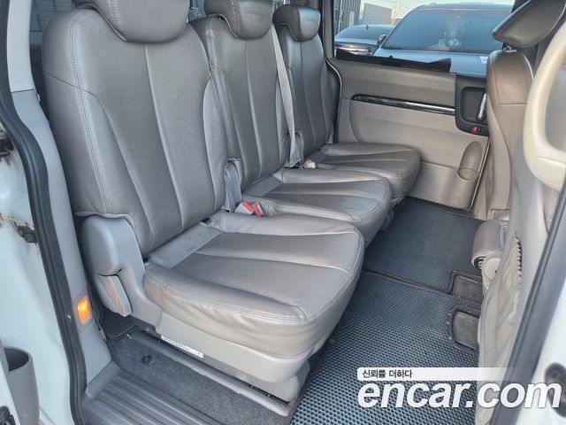 Kia Canival 2014 — photo 11