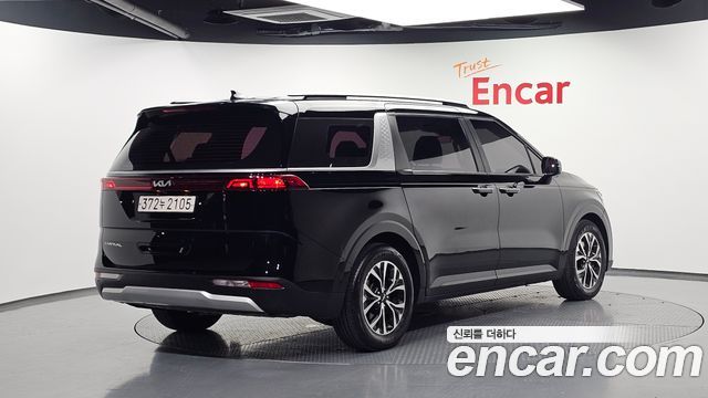 Kia Canival 2022 — photo 2