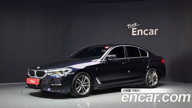 BMW 5-Series 2018 — photo 1