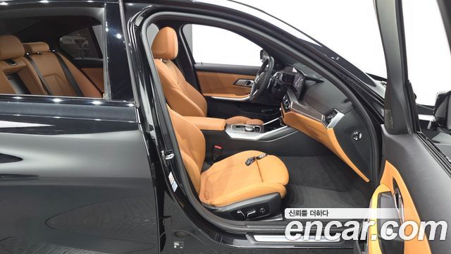 BMW 3-Series 2024 — photo 16