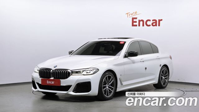 BMW 5-Series 2023 — photo 1