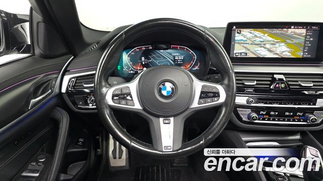 BMW 5-Series 2023 — photo 12
