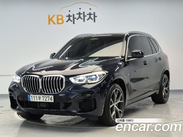 BMW X5 2022 — photo 1
