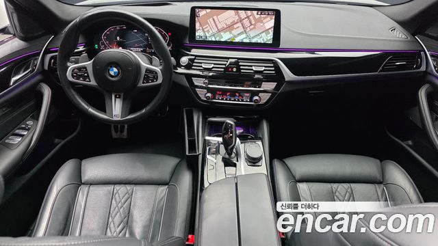 BMW 5-Series 2023 — photo 10