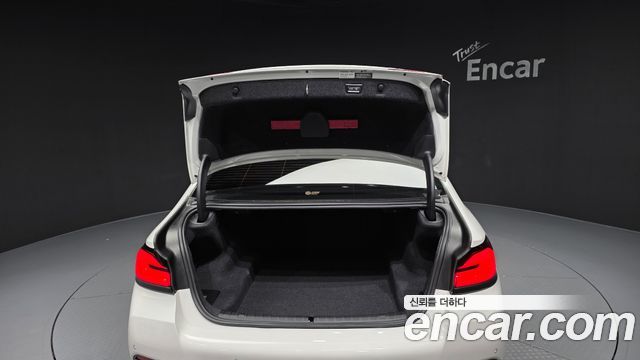 BMW 5-Series 2023 — photo 26