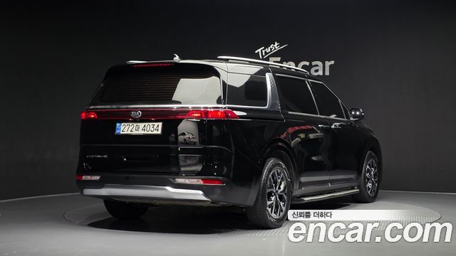 Kia Canival 2021 — photo 2