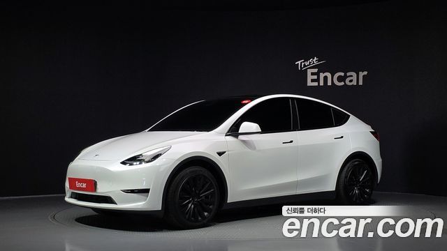 Tesla Model Y 2024 — photo 1