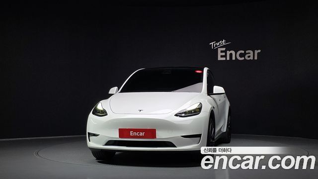 Tesla Model Y 2024 — photo 3