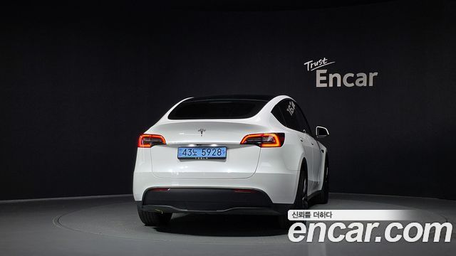 Tesla Model Y 2024 — photo 4