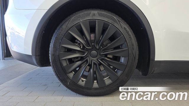 Tesla Model Y 2024 — photo 5